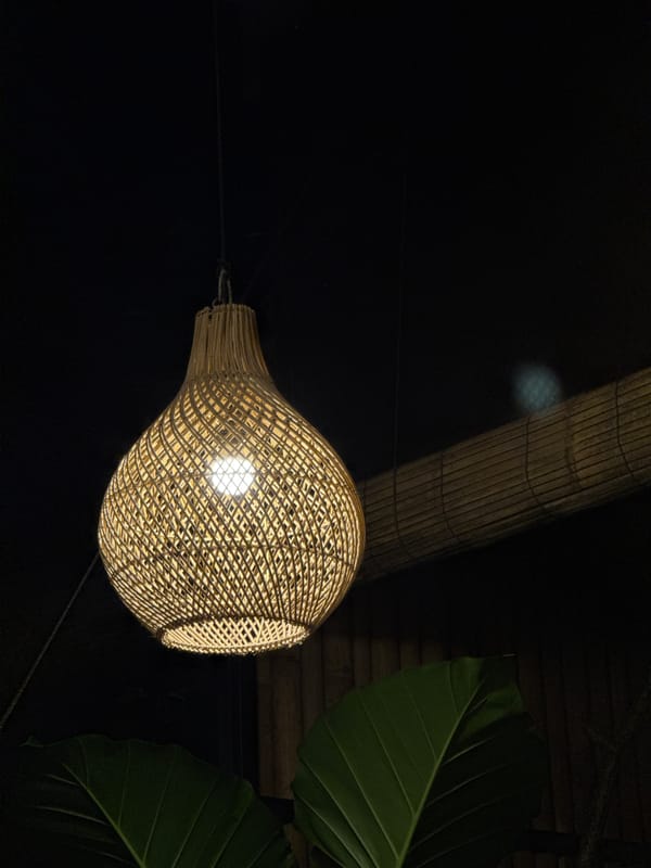Artisan décor and tea service at a Sukawati night spot