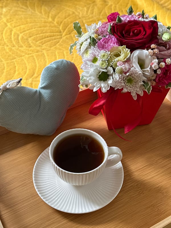 Morning coffee and flower bouquet in Wisła