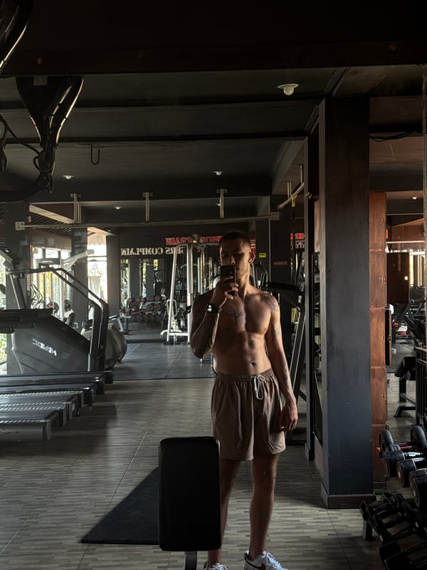 Man takes selfie at gym in Pererenan, Indonesia