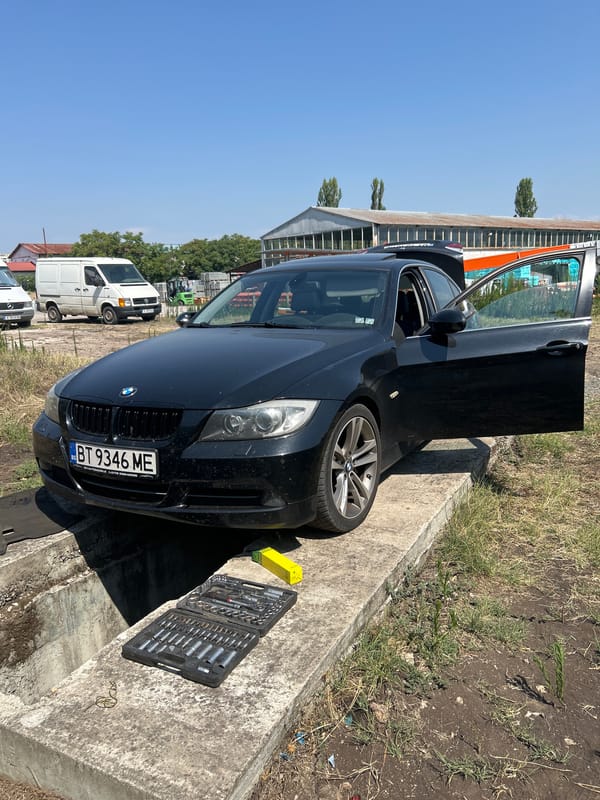 BMW gets serviced at an outdoor pit stop in Dimitrovgrad