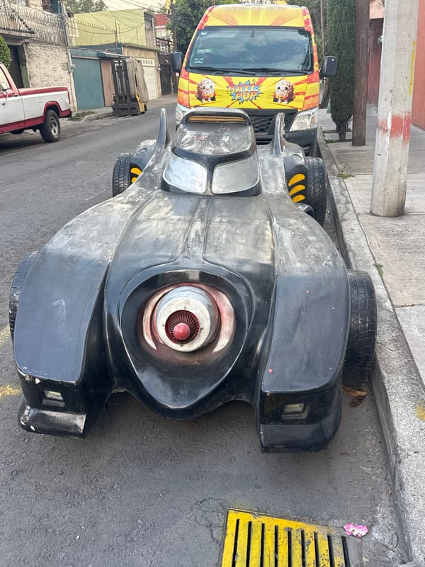 Mexico City evening captures Batman car, aircraft, street art