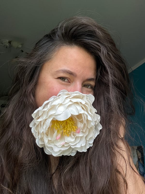 Woman photographed with artificial flower in Kazan
