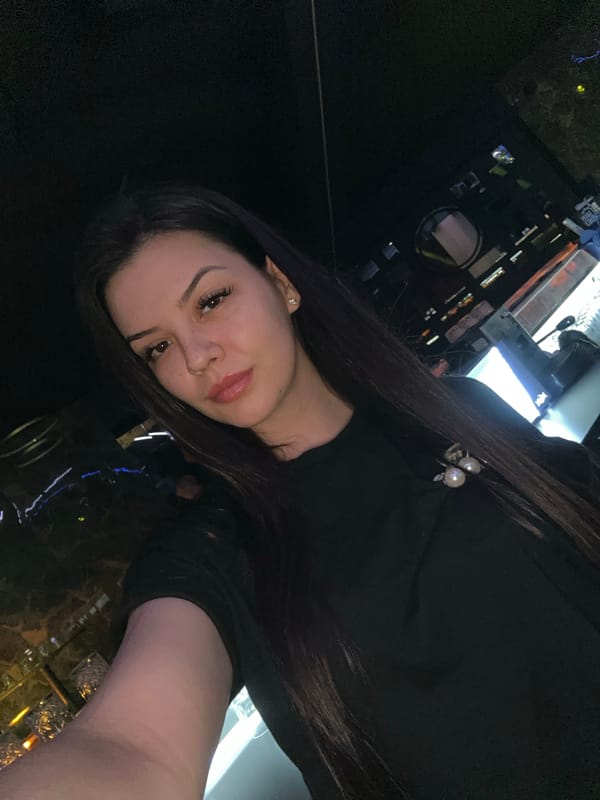 Night out selfies at a dimly lit club in Sliven
