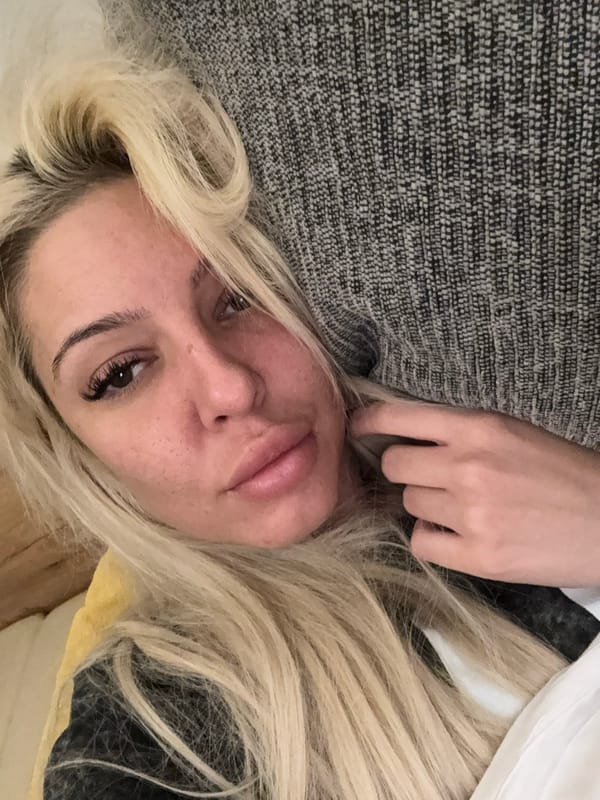 Woman photographed in casual bedroom moments in Sofia