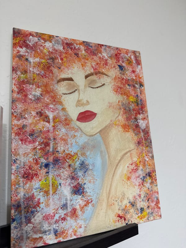 Painting of reclining blonde woman observed in Burgas, Bulgaria
