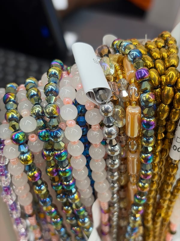 Colorful beaded strands photographed at craft shop in Igboefon