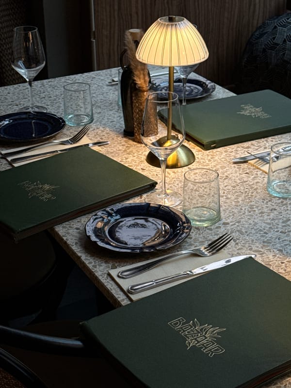Restaurant table setting observed in Luxembourg with blue plates