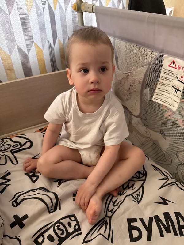 Domestic moments captured in Rusanovo: woman, children photographed