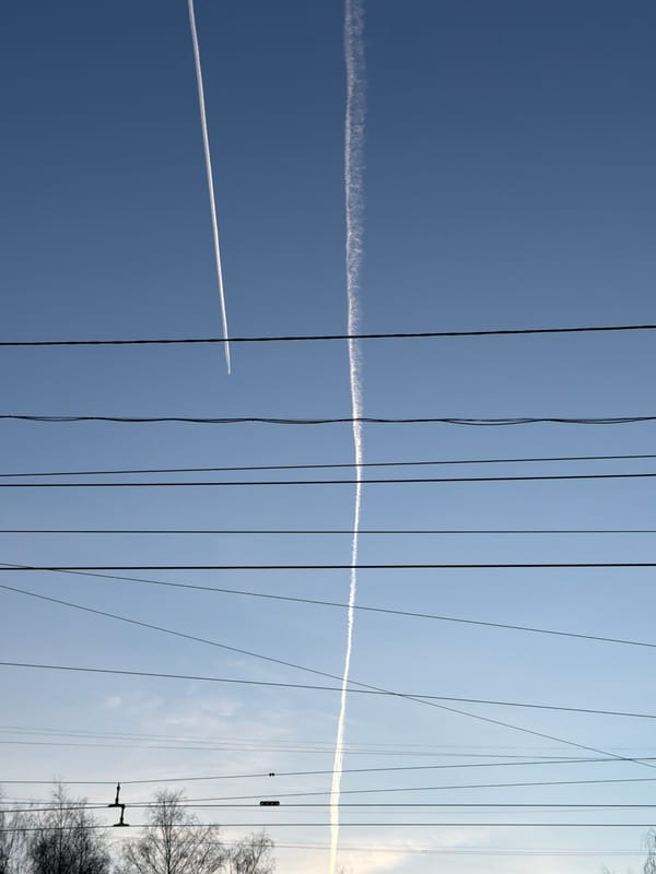 Aircraft contrails and power infrastructure observed in Izhevsk skies