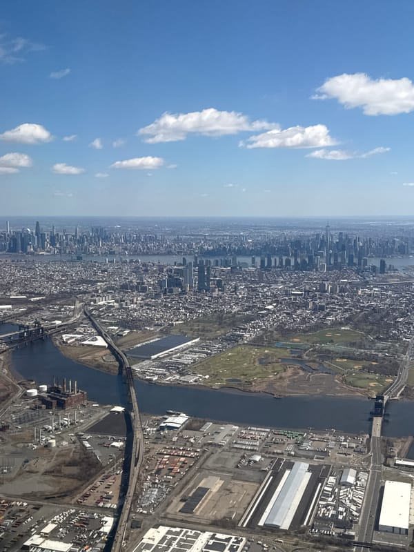 Aerial view captures Newark cityscape under blue skies