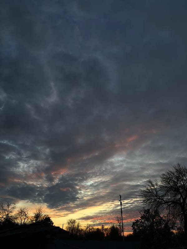 Sunset with striated clouds observed in Komsomolskiy, Russia