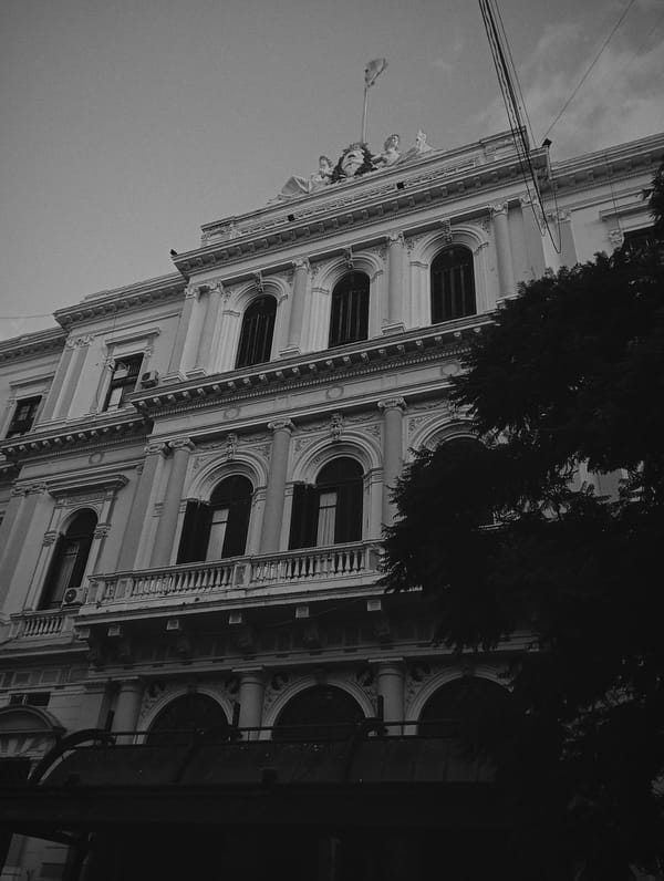 Evening street photography captures Buenos Aires government district architecture
