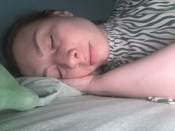 Woman rests peacefully in Moscow bedroom