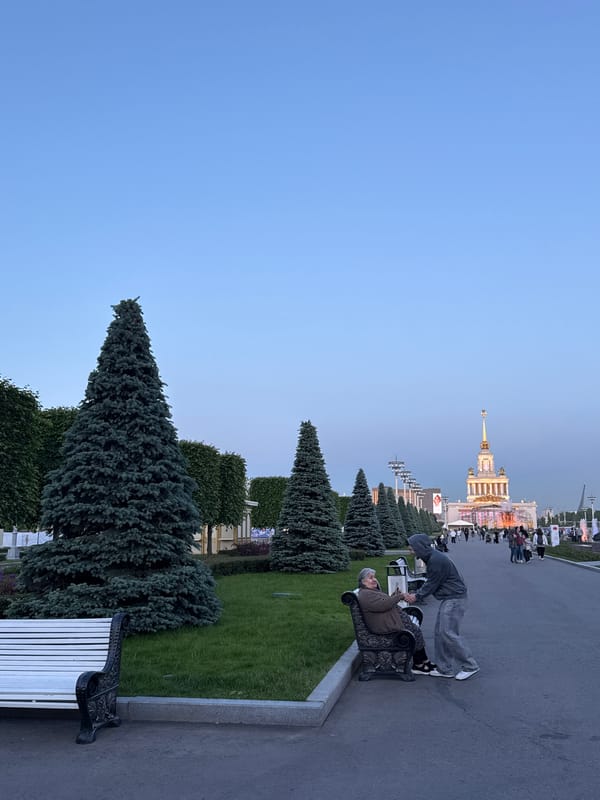 Ornate domed building photographed at twilight in Moscow