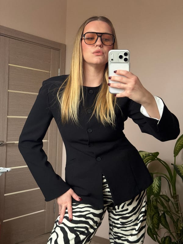 Woman documents morning routine in Dreiliņi apartment