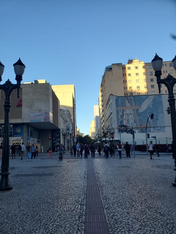 Evening street life documented in downtown Curitiba, Brazil