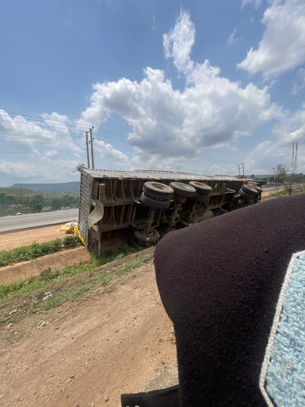 Cargo truck overturns on roadside in Lokoja, Nigeria