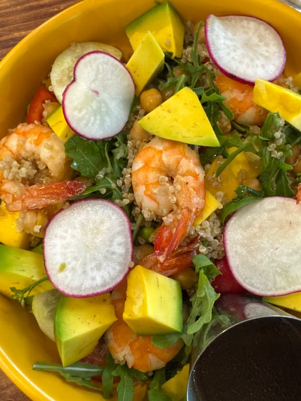 Shrimp and mango quinoa salad in a yellow bowl, Đà Nẵng