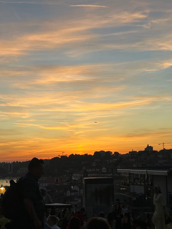 Crowds gather in Vila Nova de Gaia for sunset viewing