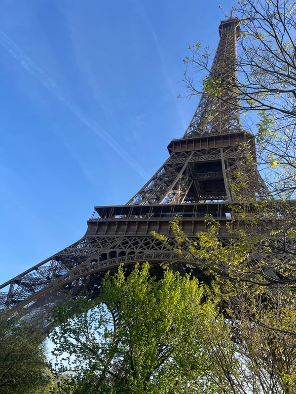 Morning view of Eiffel Tower captured against blue sky