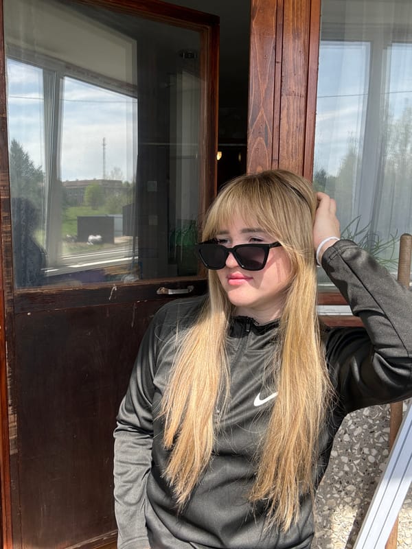 Woman photographed in casual athletic wear inside Russian residence