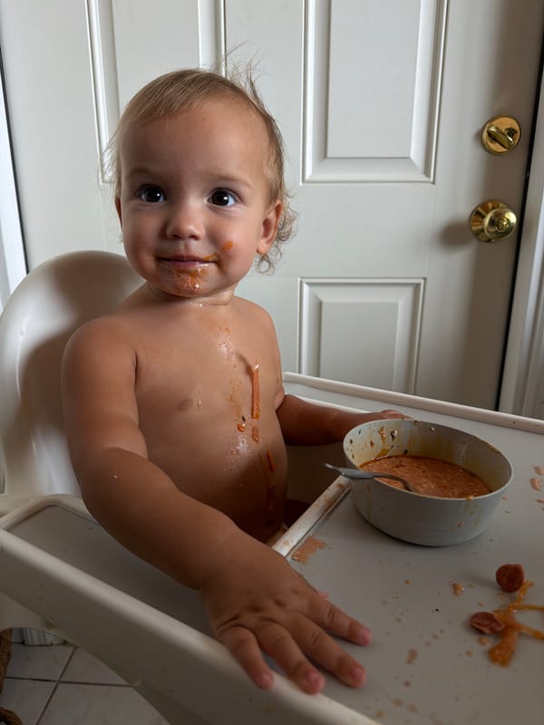 Toddler makes mess during mealtime in Miami Beach