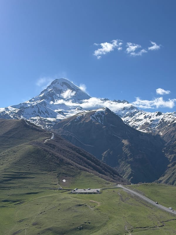 Tourist captures Georgian mountain scenery and historic church