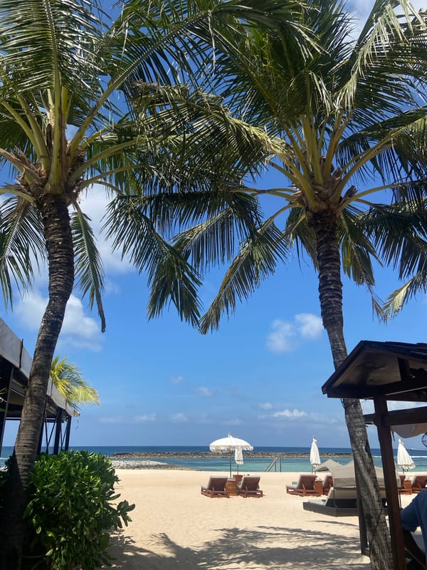 Morning beach moments captured in Kuta Selatan, Indonesia