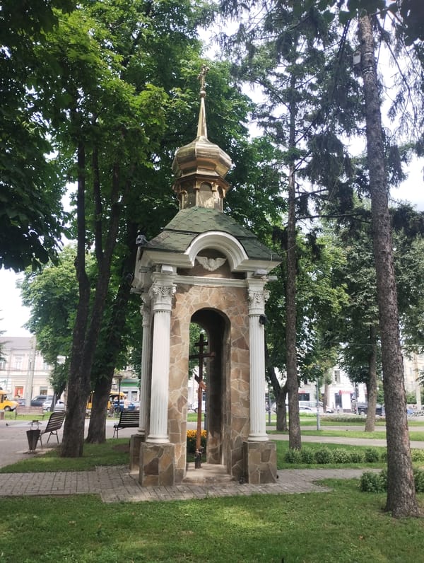 Chapel and colorful flower beds in a Sumy park