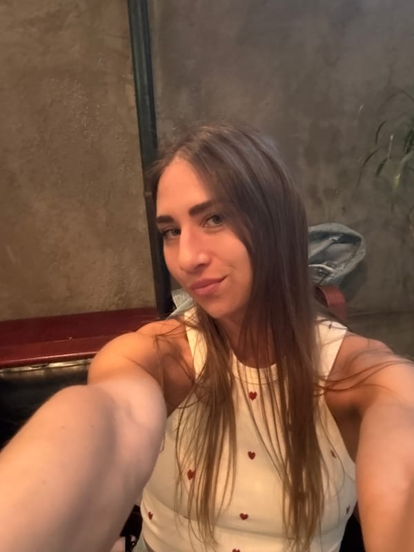 Quick back-to-back selfies from an indoor spot in Saint Petersburg.