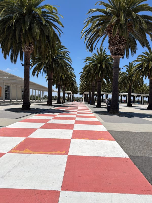 Irvine outdoor event features police Cybertruck and Barcelona Academy setup