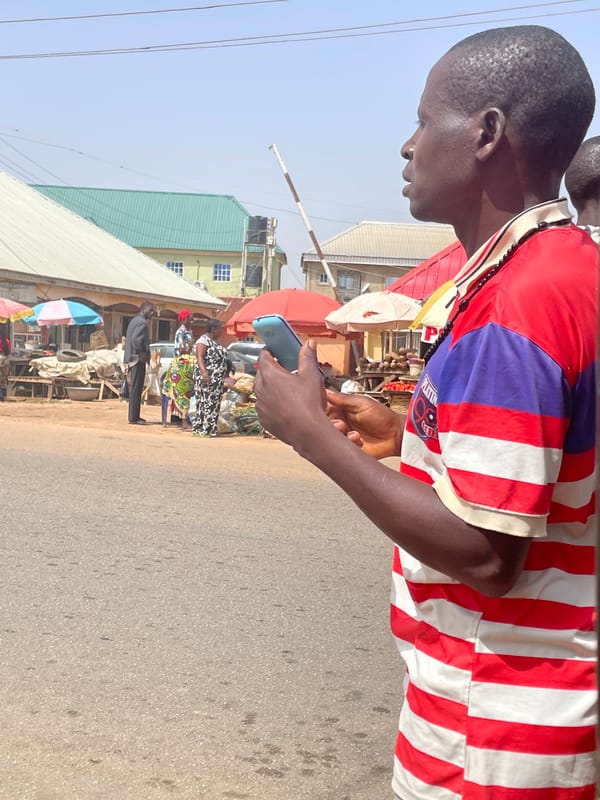 Morning market activity and street traffic observed in Jos