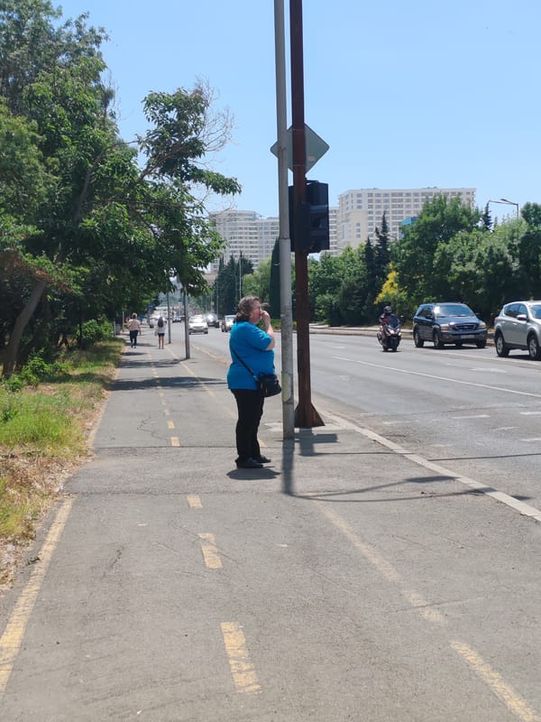 Burgas streets on a sunny morning — scooters, pedestrians, everyday movement