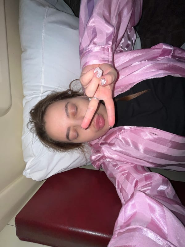 Woman resting indoors captured in casual moments in Lomy