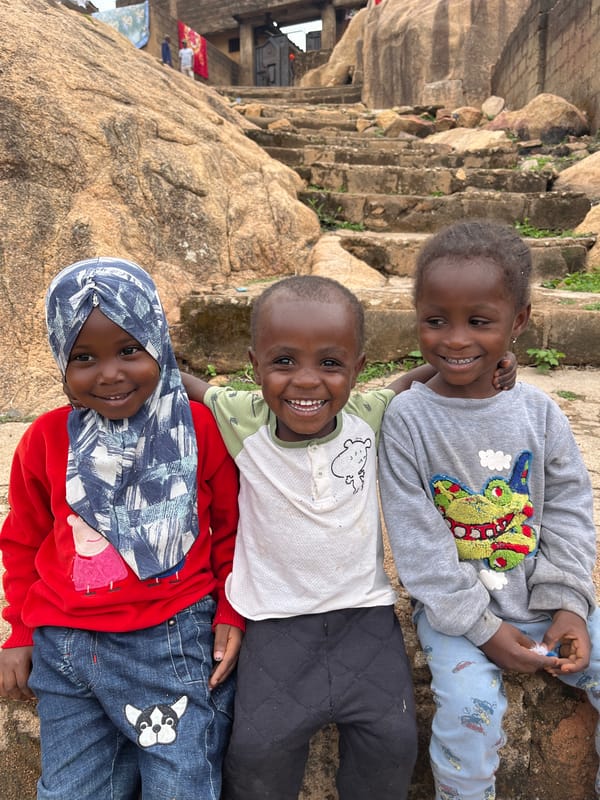 Children play, vendors work in Nigerian towns