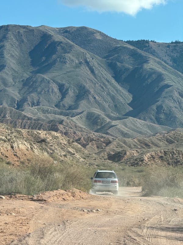 Clear skies observed over mountainous terrain near Tosor, Kyrgyzstan