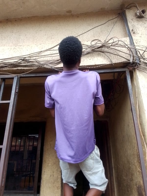 Morning street life documented in unidentified urban community