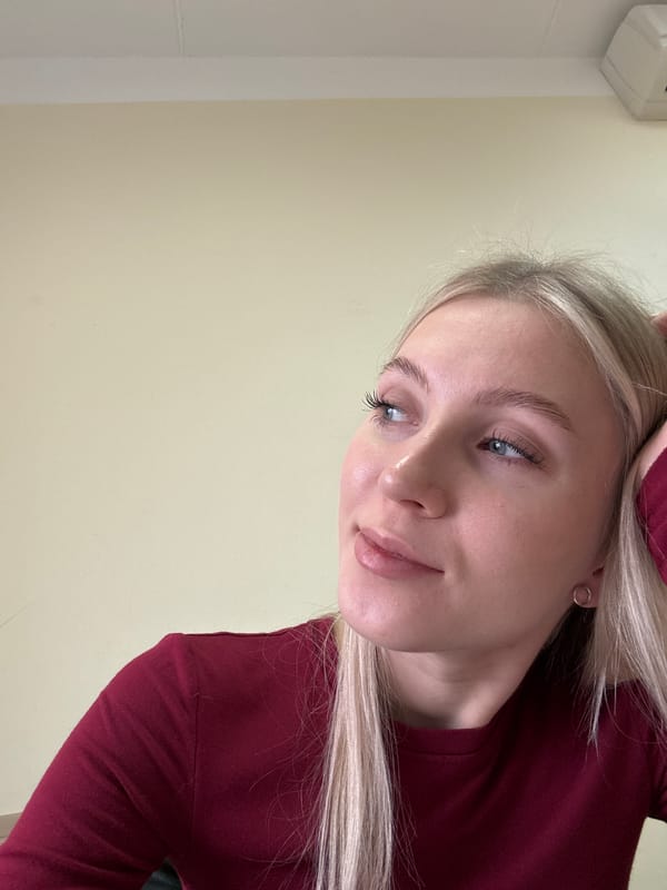 Woman documents creative selfie session with props in Izhevsk