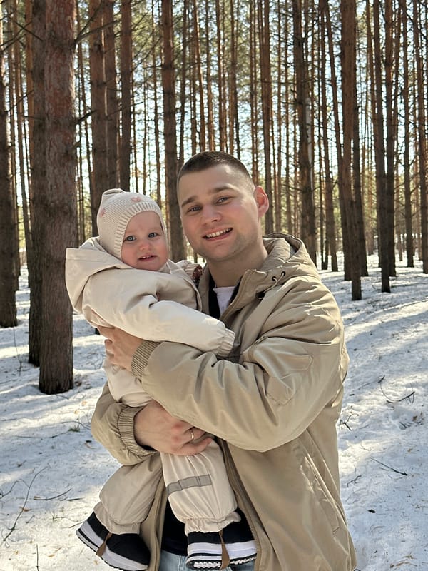 Family enjoys winter forest outing in Chaikovsky, Russia