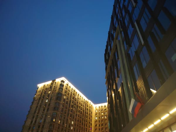 Evening building lights across Moscow area neighborhoods