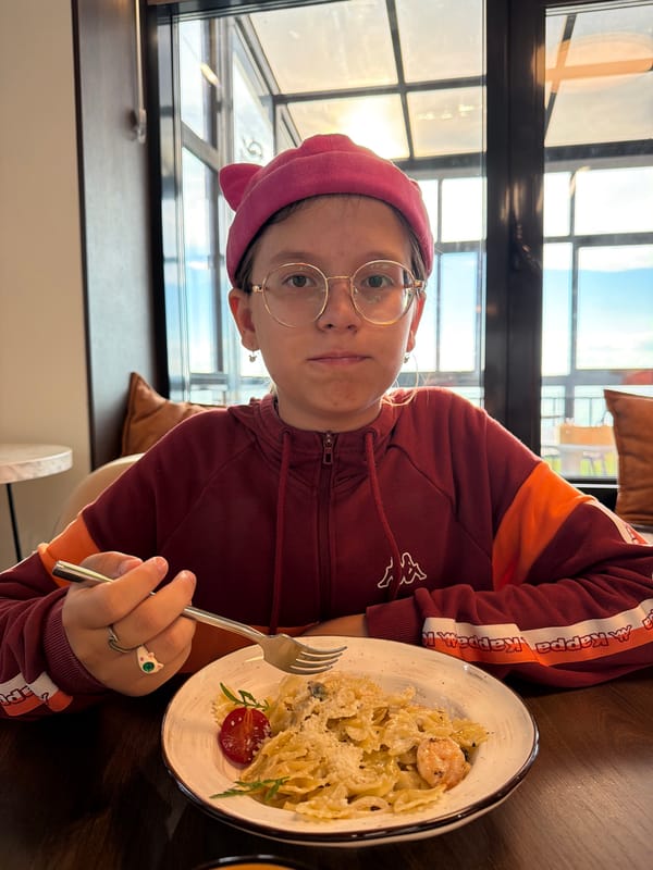 Father and son enjoy afternoon meal and forest walk in Chaikovsky