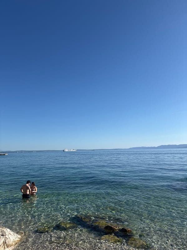 Cliff jumper leaps into ocean near Rijeka, Croatia