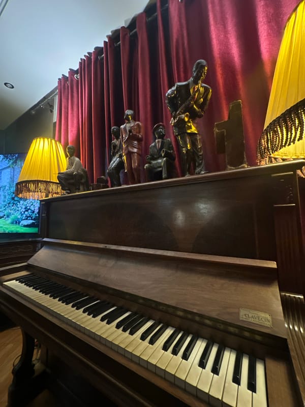 Interior spaces with piano and artwork documented in Meknes