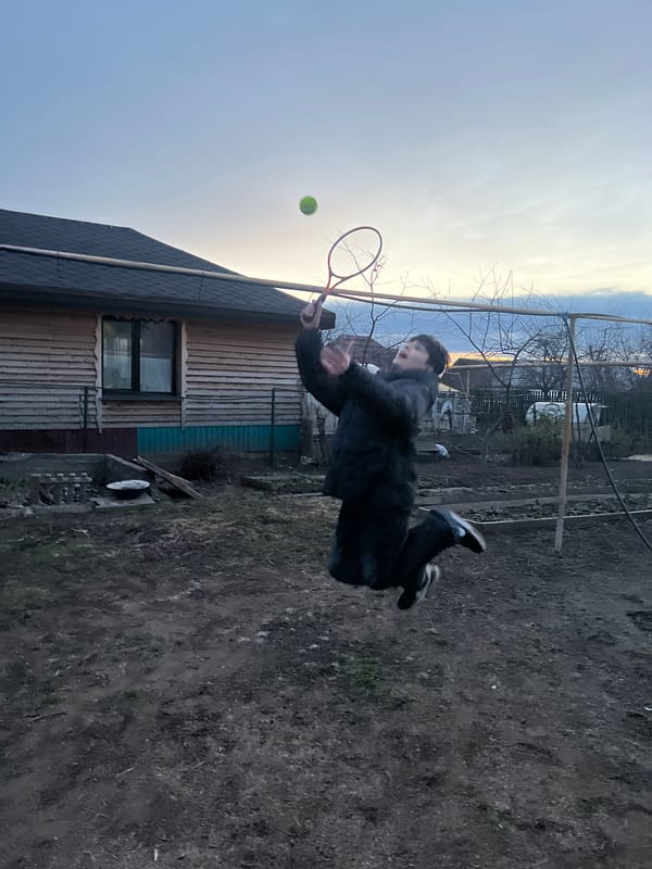 Tennis practice captured at sunset in rural Votkinsk, Russia