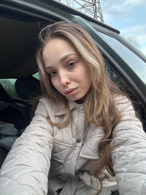 Woman takes selfie in vehicle in Chaikovsky, Russia