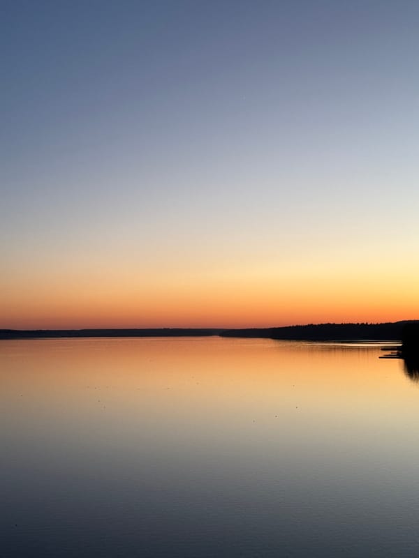 Sunset captured over water in Votkinsk, Russia