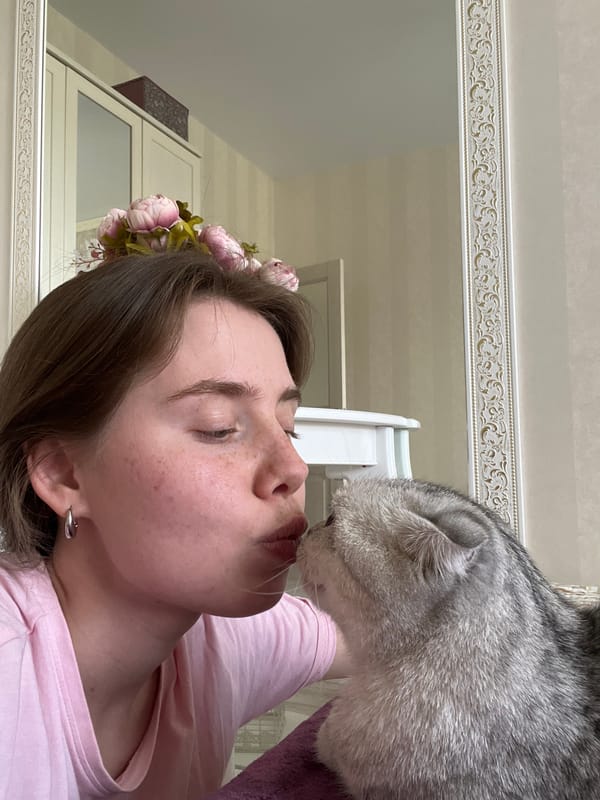 Woman shares tender morning moments with tabby cat in Russia