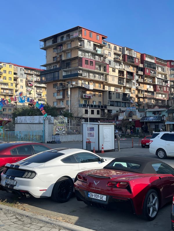 Vintage cars spotted on sunny Batumi waterfront promenade