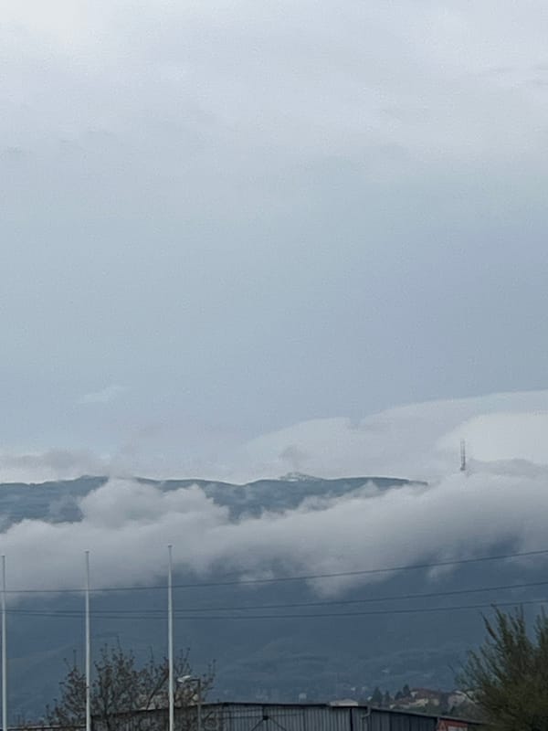 Morning witness captures mountains, Orthodox church, classical architecture