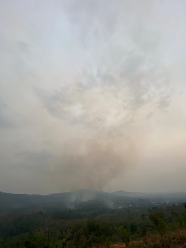 Smoke from hillside fire reduces visibility in Nigerian mountains